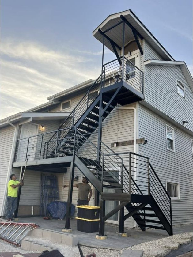 Multi-story steel porch and stair rebuild