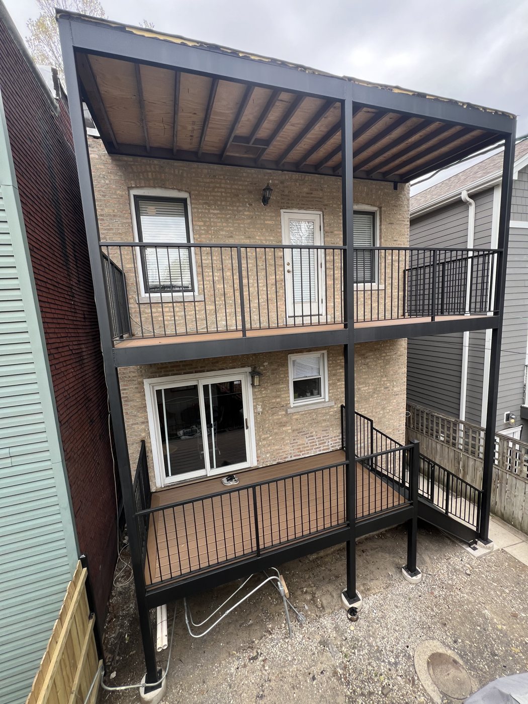 Two-story porch and deck system rebuilt in steel, Chicago