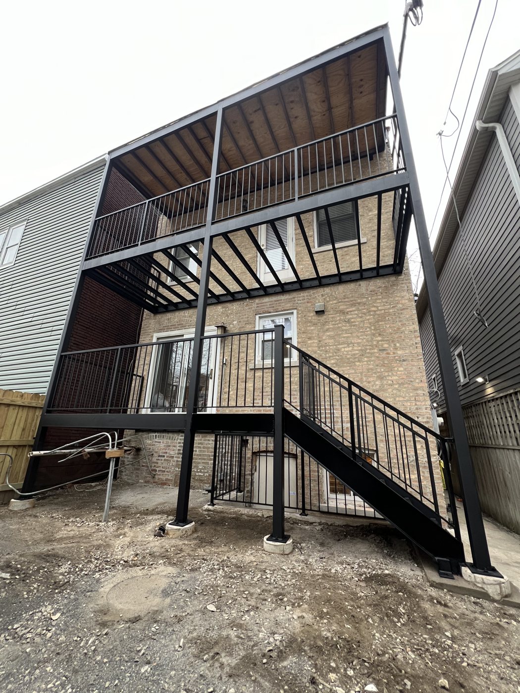 Two-story steel porch system by Brothers Welding Work, Chicago