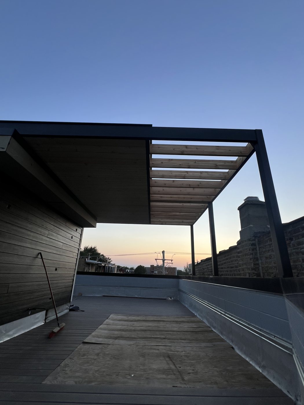 Steel and wood rooftop pergola